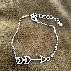 Trendy Arrow Necklace with silver metal chain from Chicago boutique.